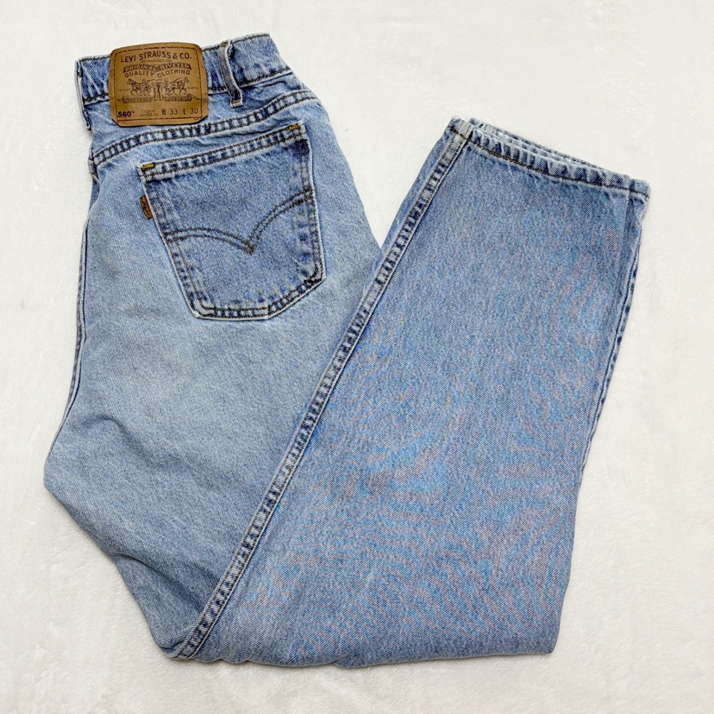 Vintage Levi's 560 Orange Tab Loose Fit Tapered Light Wash Jeans 33x30 USA Made